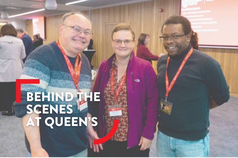Three QUB staff (two male and one female) smiling and facing the camera
